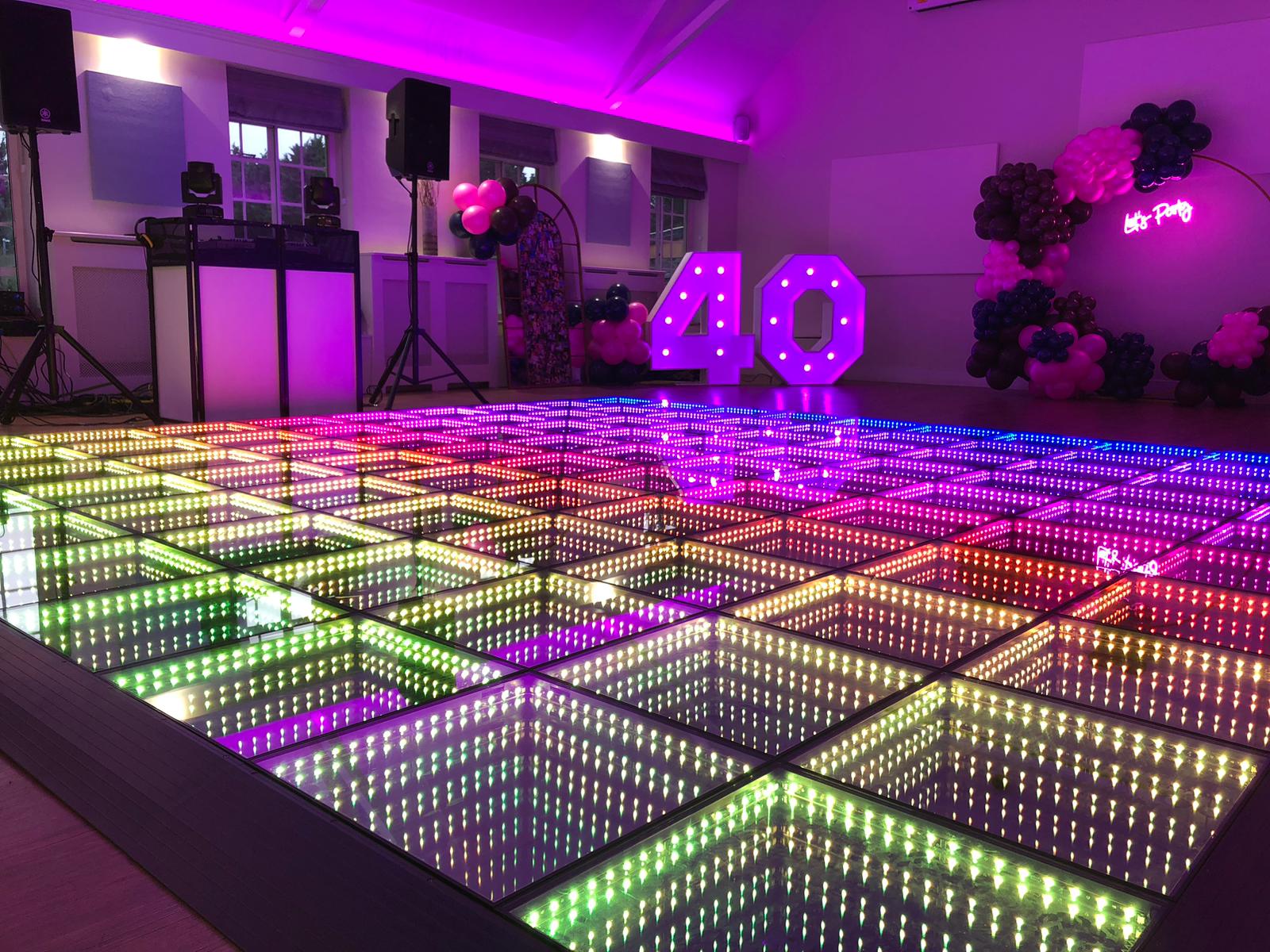 Infinity dance floor lit in rainbow colours at a Perth birthday party